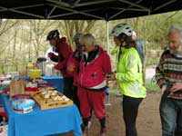 Buying cakes at the Charity Stall