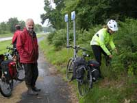 Picking wild raspberries in the rain